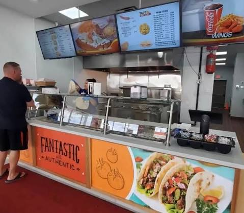 Taco counter with fresh menu items